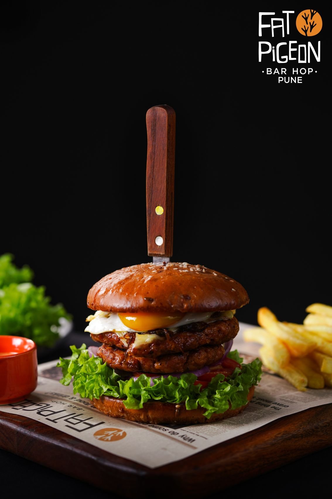 Burger with fries, shot for Fat Pigeon