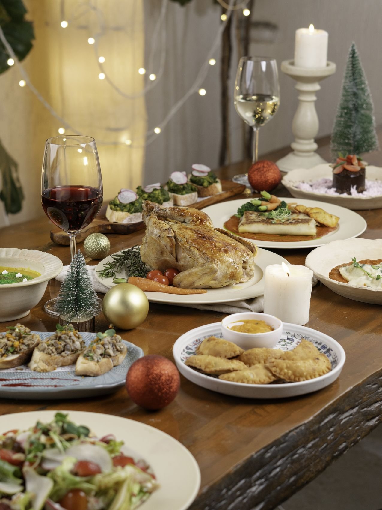 Festive table spread with wine and candles