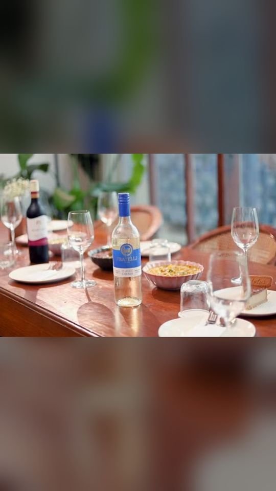 Restaurant table set with wine and plates